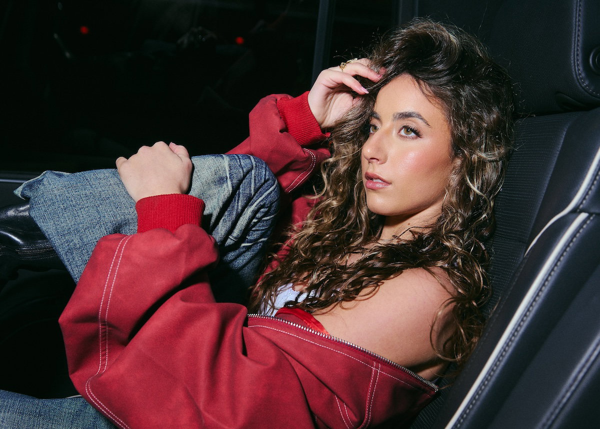 GiaNina Paolantonio car leaning